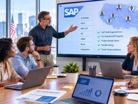 Diverse corporate team in a modern boardroom discussing SAP staff augmentation shown on a screen.