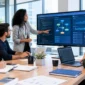Software development team collaborating on custom software, code, workflows, and analytics in a modern corporate office.